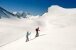 Österreich, Zauchensee, junges Paar Ski in Bergen