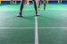 Beine von Badmintonspielern