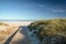 Steg und weißer Sandstrand in Bornholm
