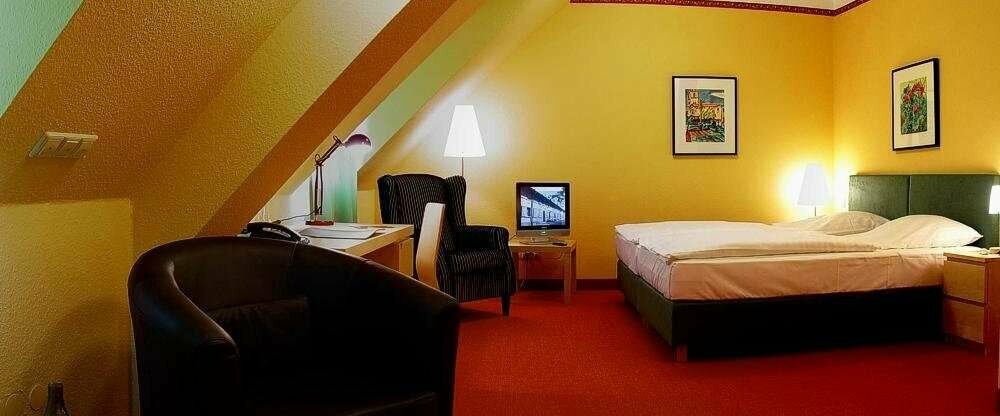 Schlafbereich in einem unserer Doppelzimmer DELUXE