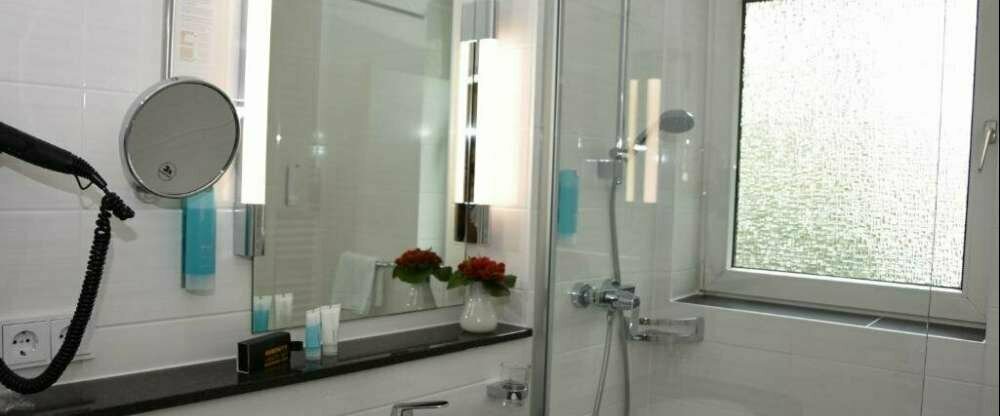 AKZENT Concorde Hotel Viktoria - Badezimmer