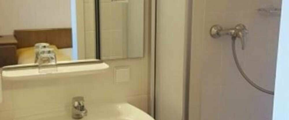 AKZENT Hotel Strandhalle - Badezimmer