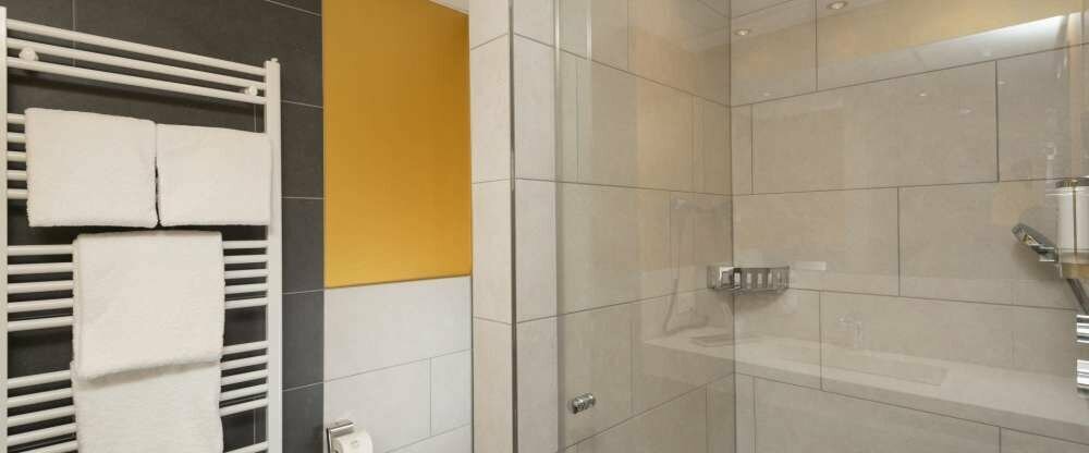 Badezimmer aller Zimmerkategorien