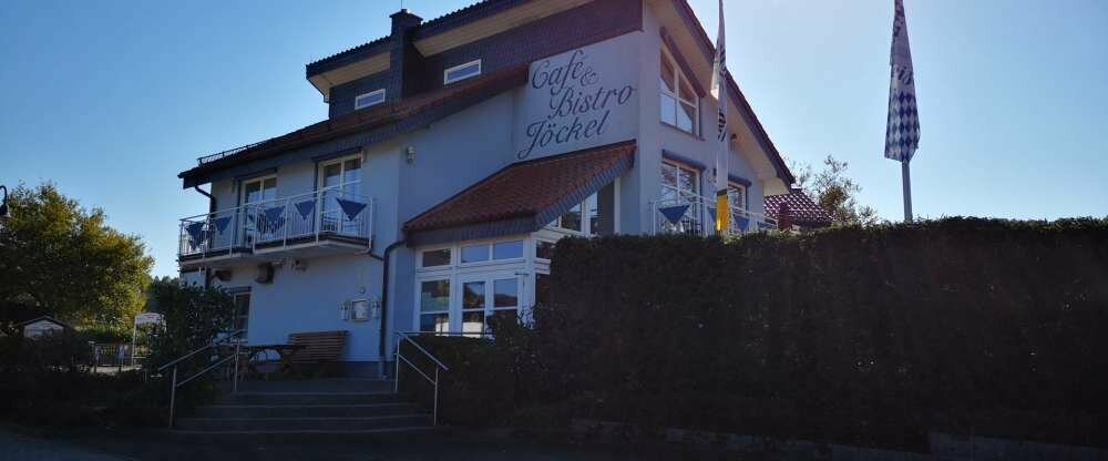 Hausgemachte Torten & Kuchen Terrasse mit Blick auf den Nieder Mooser See