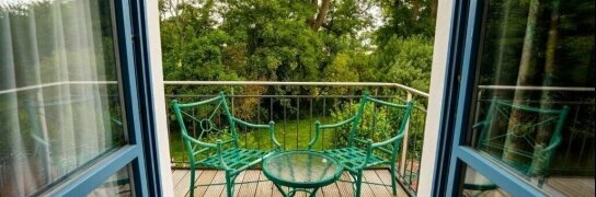 Deluxe Doppelzimmer mit Balkon, Quelle: Hotel Rügenschmiede vis a vis Hiddensee
