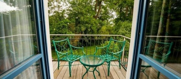 Deluxe Doppelzimmer mit Balkon, Quelle: Hotel Rügenschmiede vis a vis Hiddensee