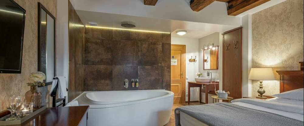 Deluxe Doppelzimmer mit Eckbadewanne zur Einzelnutzung (Kopie)