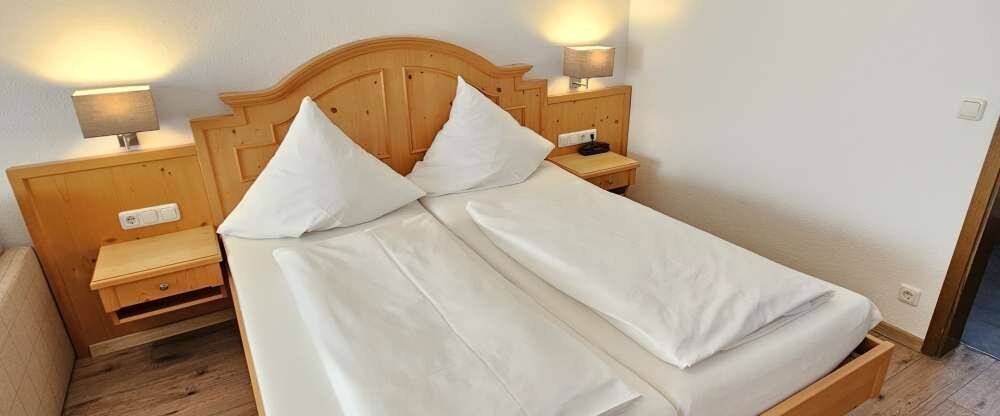 Genießen Sie Ihre Auszeit vom Alltag in hellen, gemütlich eingerichteten Zimmern.