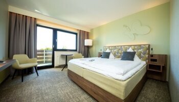 Das Doppelzimmer Fernblick verfügt über einen einzigartigen Talblick und Balkon.