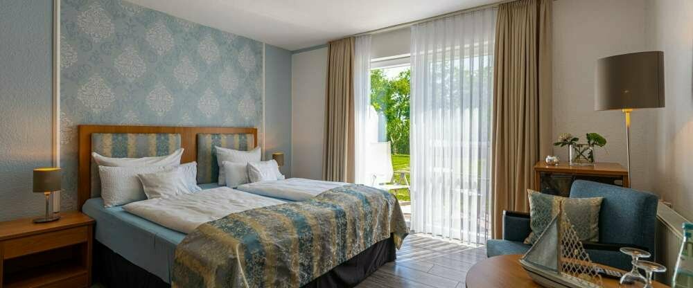 Doppelzimmer im Gästehaus mit Terrasse