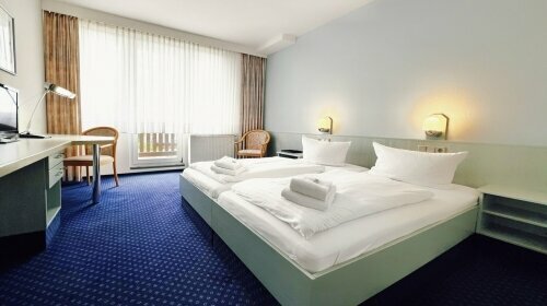 Die Standard-Zimmer befinden sich in der 2. Etage des Hotels. Sie sind ca. 18 qm groß.
