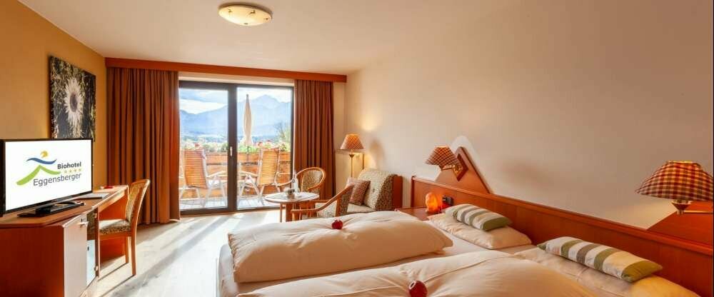 Zimmerbeispiel: Doppelzimmer Südpanorama COMFORT mit Balkon nach Süden zur Gartenseite