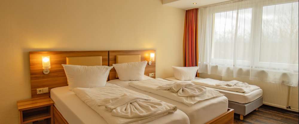 Zimmergröße: 22m² Betten-Typ: Doppel & Einzel Bettgröße: 1,80 x 2,00 m & 0,90 x 2,00 m