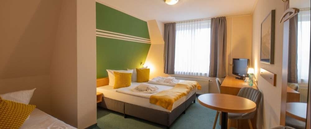 Dreibettzimmer