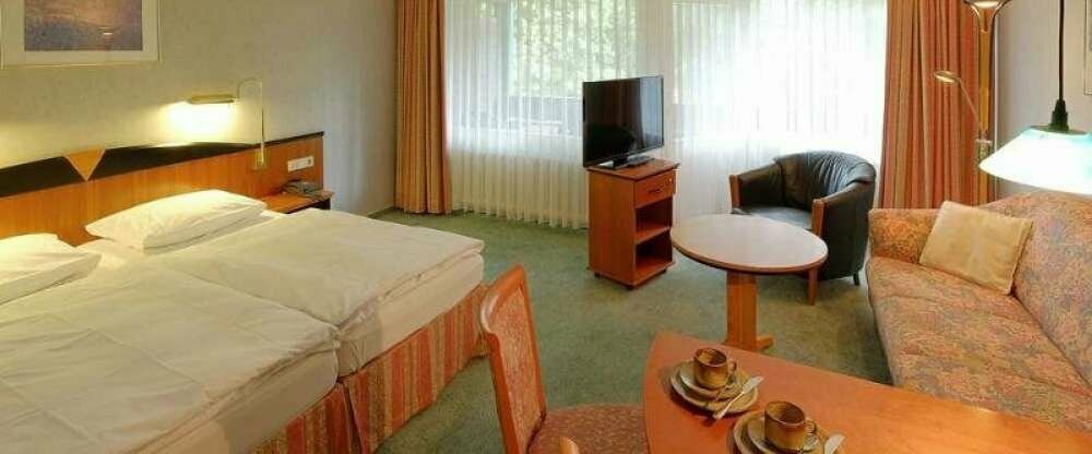 Dreibettzimmer mit Balkon