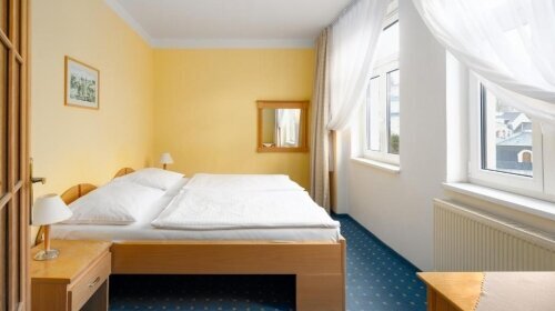 Dieses Dreibettzimmer mit Blick auf die Stadt und den Fluss in Karlovy Vary ist eine ideale Wahl für Familien oder kleine Gruppen.