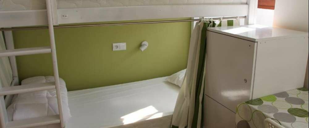 Einzelbett (Etagenbett) im gemischten Schlafsaal mit insgesamt 12 Schlafplätzen. Nutzung eines Gemeinschaftsbadezimmers.