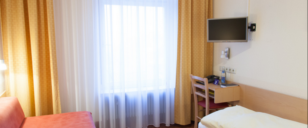 Einzelzimmer mit Sofa