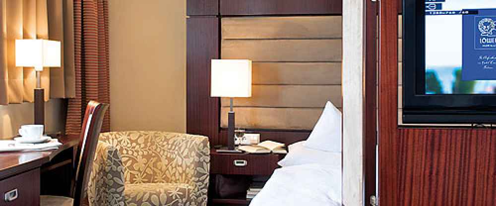 Einzelzimmer mit Balkon zum See