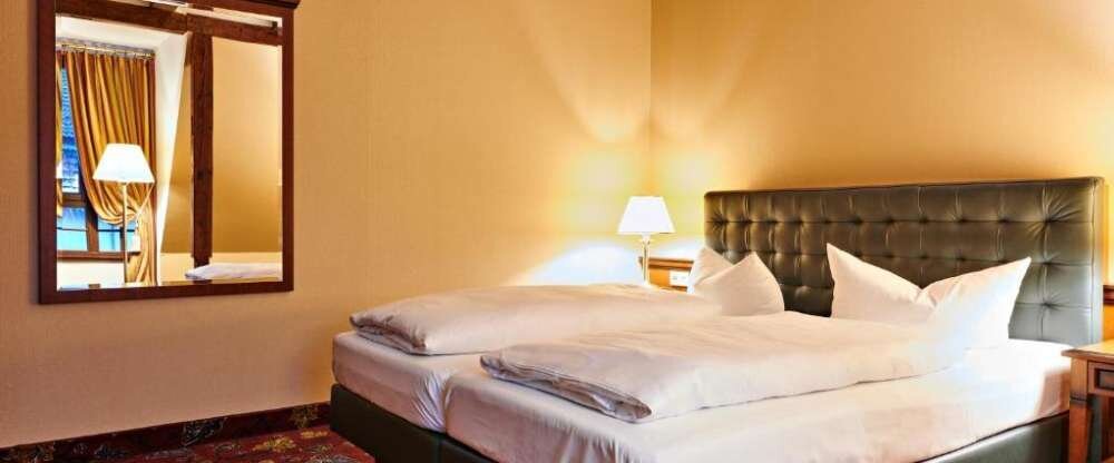 Einzelzimmer für 1 Person mit Standard Ausstattung in der Residenz. Das Einzelzimmer verfügt über ein eigenes Bad mit einer Dusche. Ein Flachbild-TV sorgt in diesem Einzelzimmer für Unterhaltung. In der Wohneinheit befindet sich 1 Bett.