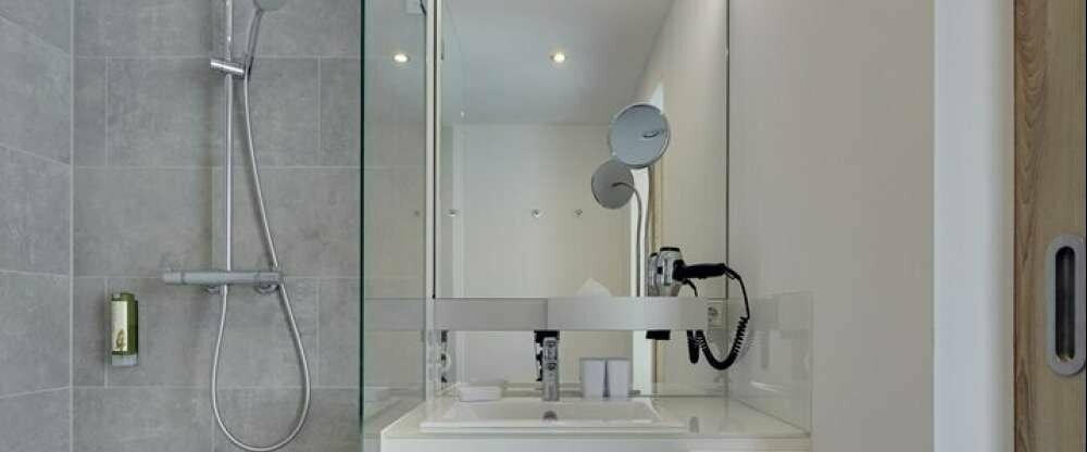 Grimm's Hotel Berlin-Potsdam - Badezimmer