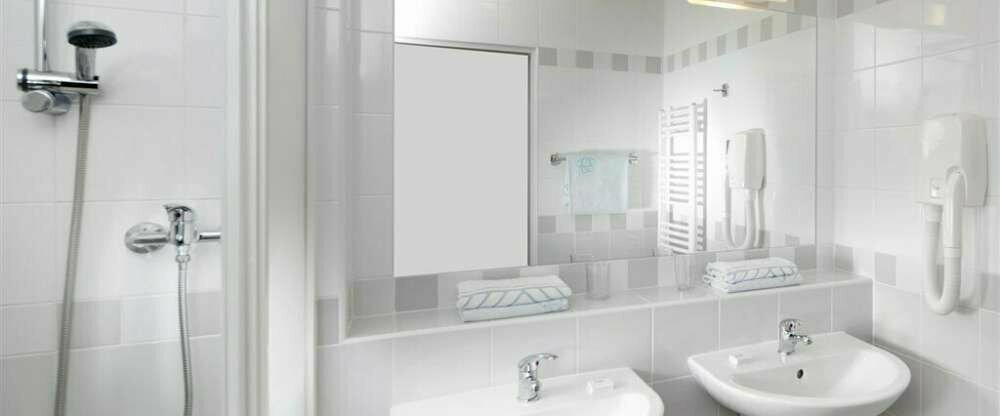 Hotel Běhounek***SUPERIOR - Badezimmer