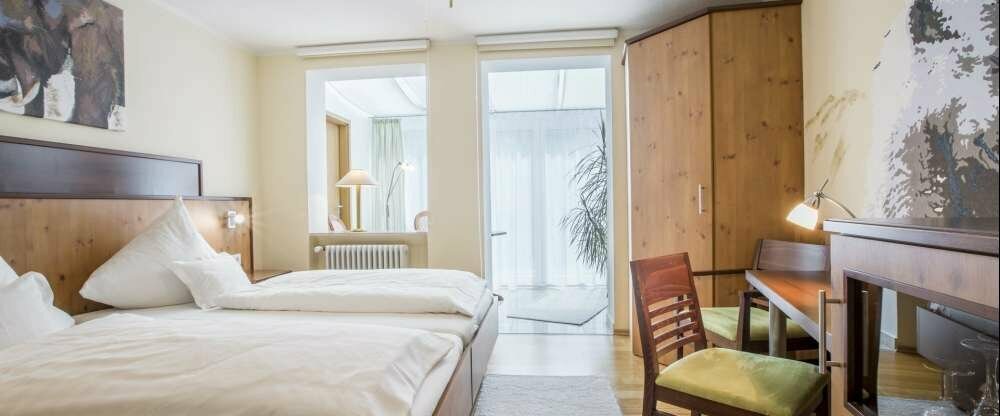 Die wunderschöne Juniorsuite mit dem lichtdurchfluteten Wintergarten