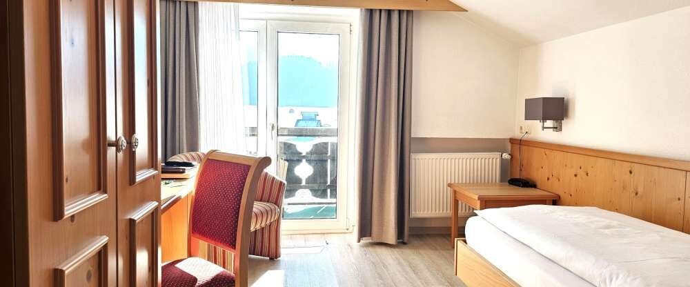 Hotel Cafe Fuggerhof - Einzelzimmer mit Süd Panoramabalkon