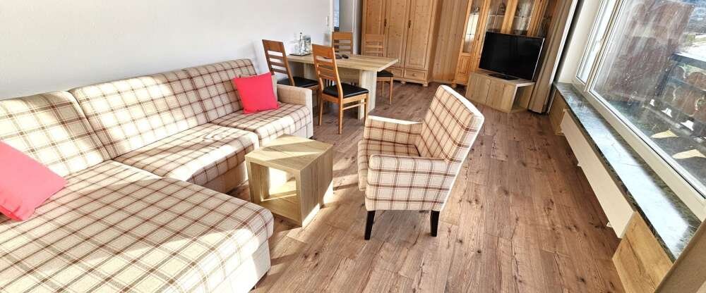 Hotel Cafe Fuggerhof - Familien Apartment Wohnzimmer mit Schlafsofa