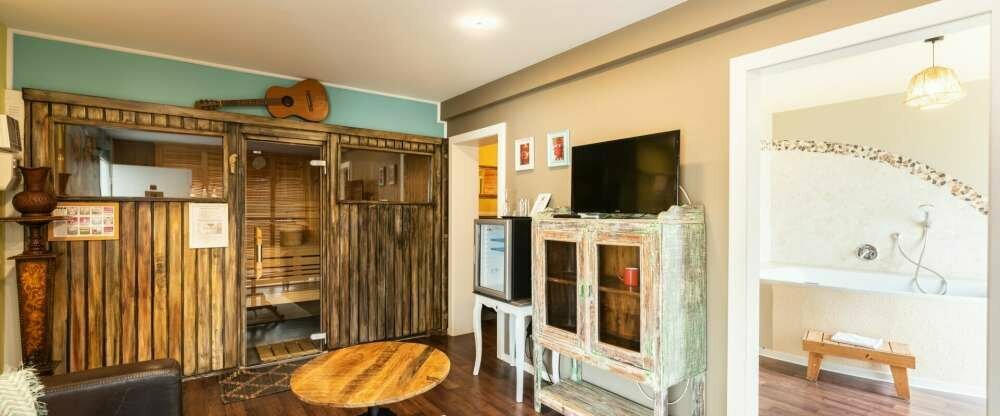 Themensuite mit Sauna, Terasse und Innenwhirlpool 