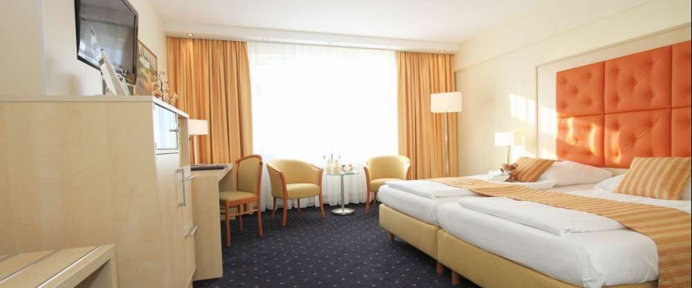 Komfortable & moderne Zimmer in Gießen. Alle Zimmer sind Nichtraucher-Zimmer und standardmäßig mit einem Schreibtisch, Telefon, Safe, einer Sitzgelegenheit und Kaffee-/Teezubereitungsmöglichkeit ausgestattet.