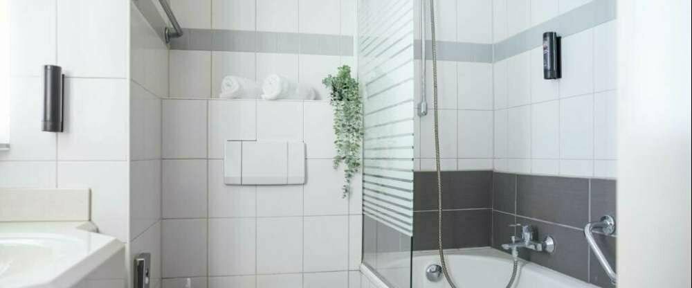 Michel Hotel Heppenheim - Badezimmer