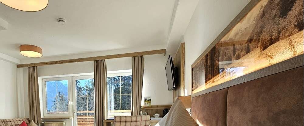 Naturhotel Cafe Waldesruhe - Doppelzimmer mit Panoramabalkon Nebelhornblick