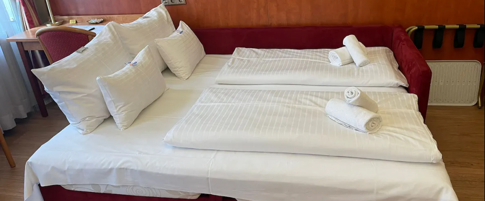 Opera Suites Vienna - Schlafsofa im Superior Doppelzimmer