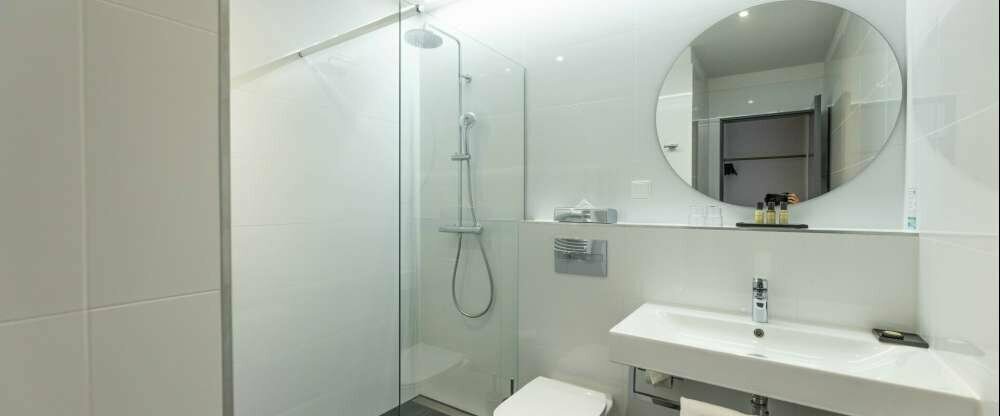 PK Parkhotel Kurhaus - Hotel-Badezimmer