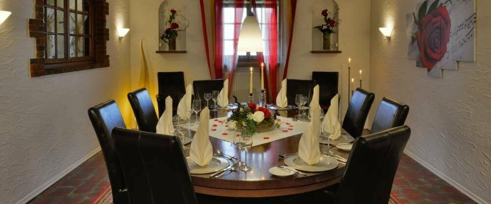 Rosenzimmer Gemütlich und privat sitzen bis zu 12 Personen