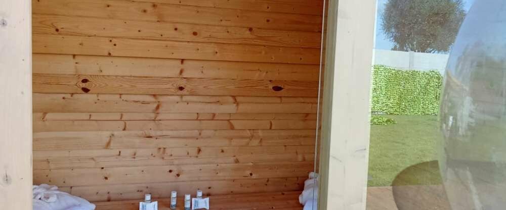 Im privaten Wellness-Garten erwartet Sie eine eigene Sauna.