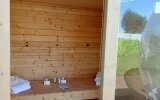 Im privaten Wellness-Garten erwartet Sie eine eigene Sauna.