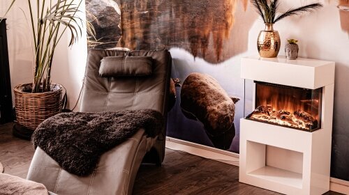Secret Wellness 40qm Kamin und Massageliege