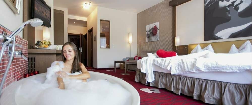 Romantisches Themen-Zimmer im Kuss Design.