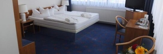 Wasserbettzimmer, Quelle: KIM Hotel Dresden