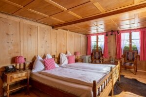 Economy Doppelzimmer mit Gemeinschaftsbad, Quelle: (c) Chalet-Hotel Lodge Merlischachen