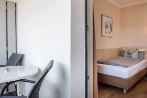 Einzelzimmer mit Balkon, Quelle: (c) Ammersee Hotel 