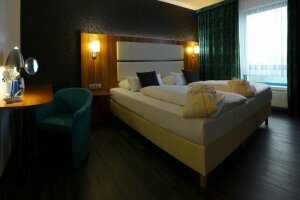 Komfort-Vierbettzimmer mit Balkon, Quelle: (c) Best Western Plaza Hotel Zwickau
