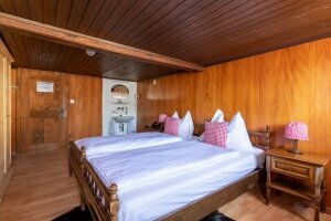 Economy Doppelzimmer mit Gemeinschaftsbad, Quelle: (c) Chalet-Hotel Lodge Merlischachen